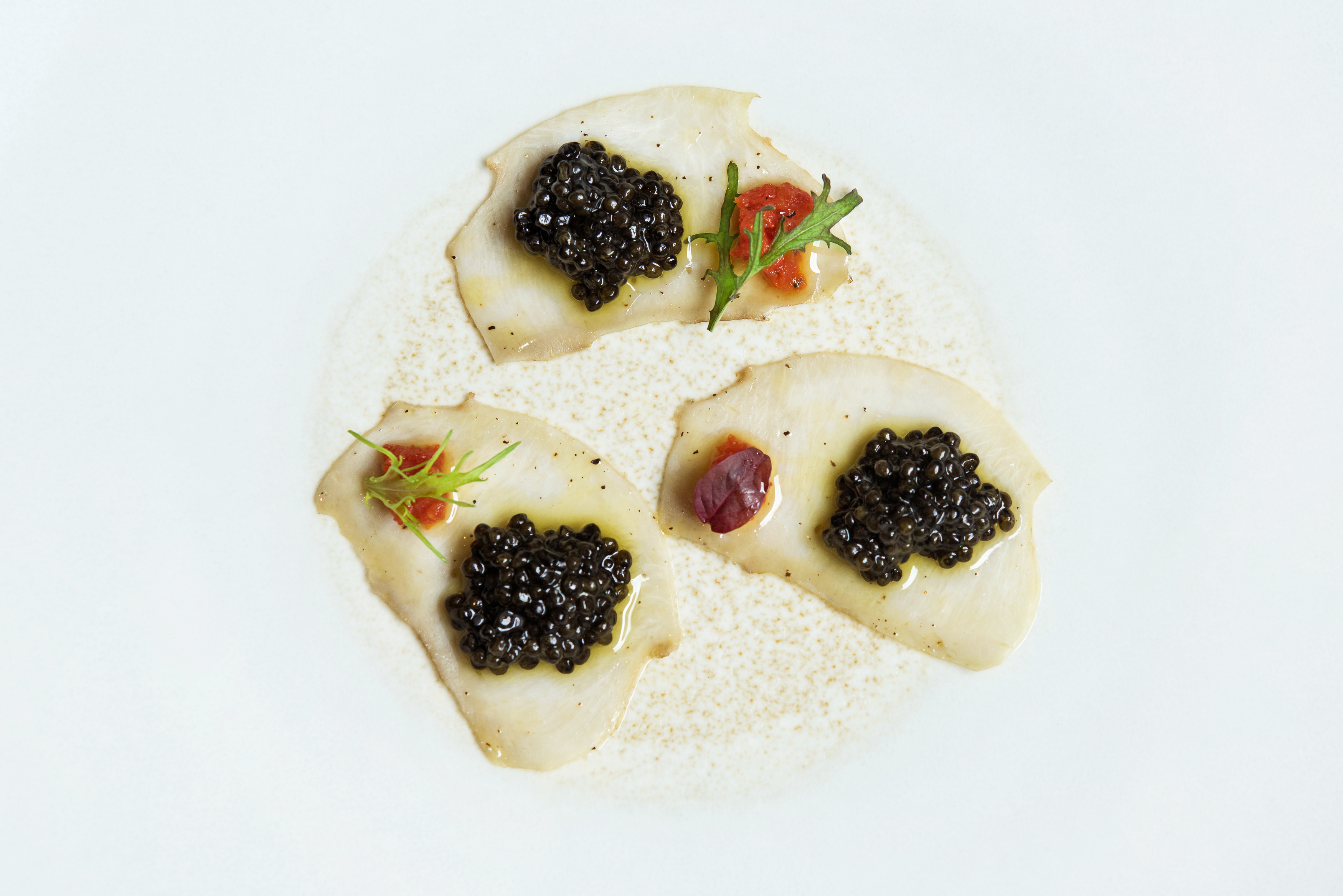 Confit Abalone Carpaccio, sweet pepper and semi-dried tomato, oscietra caviar